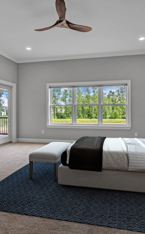 628540c56a0b6926842eb837_Madison-PrimaryBedroom-Staged